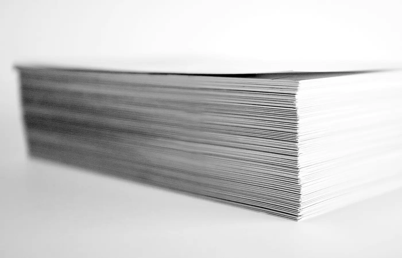 Stacked paper sheets on a scale